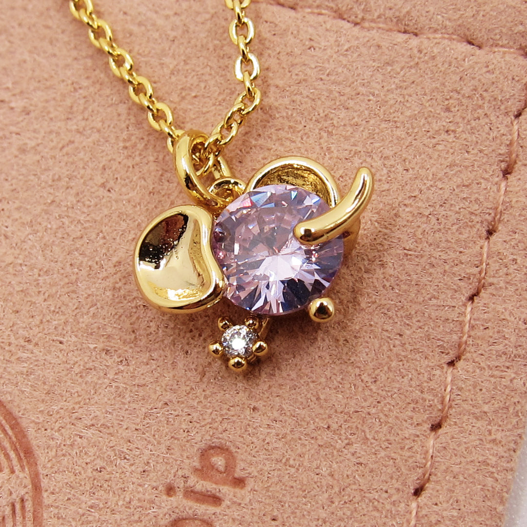 Endearing Elephant: Dainty Gold-Plated Elephant Charm Necklace with Lavender Crystal