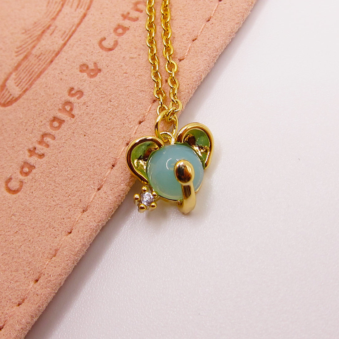 Cuddly Koala Necklace: Gold-Plated Charm with Pastel Green Stone & Crystal Accent