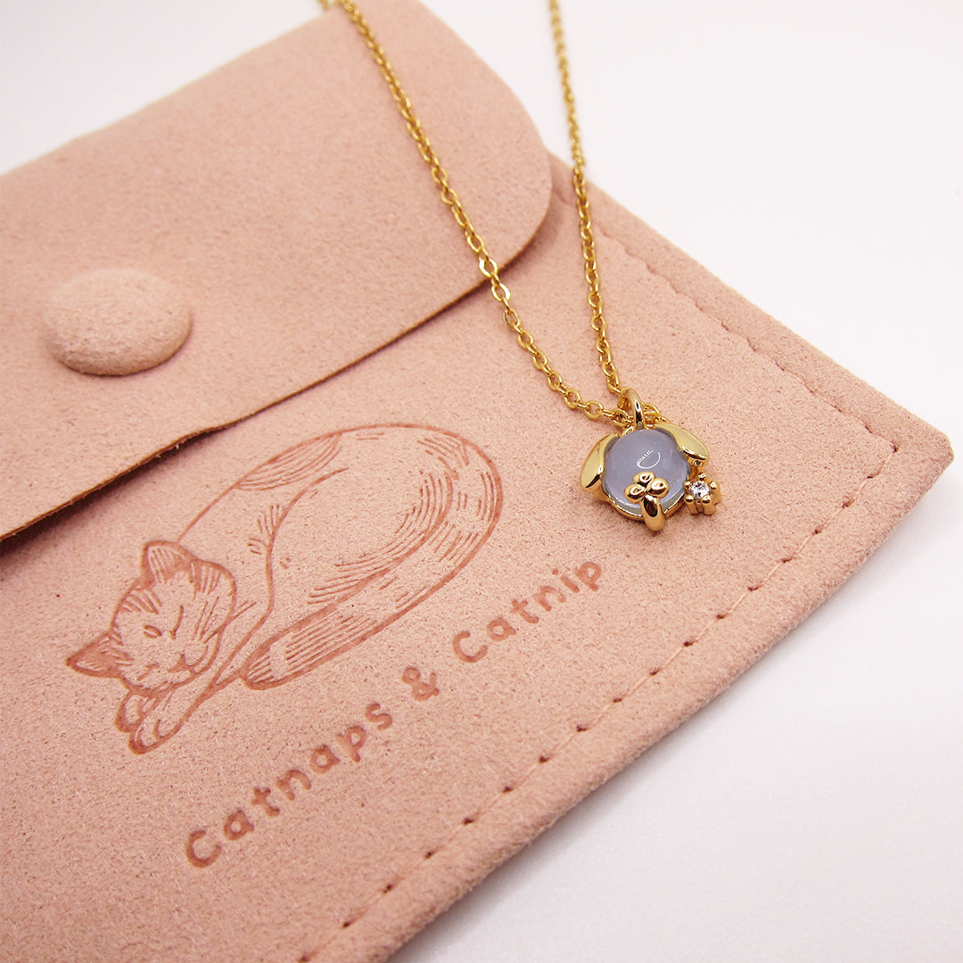 Playful Pup Moonstone Pendant: Gold-Plated Dog Charm Necklace with Crystal Accent